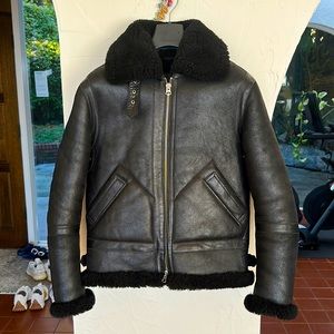 AUTHENTIC ACNE STUDIO. black shearling lined full grain leather jacket.